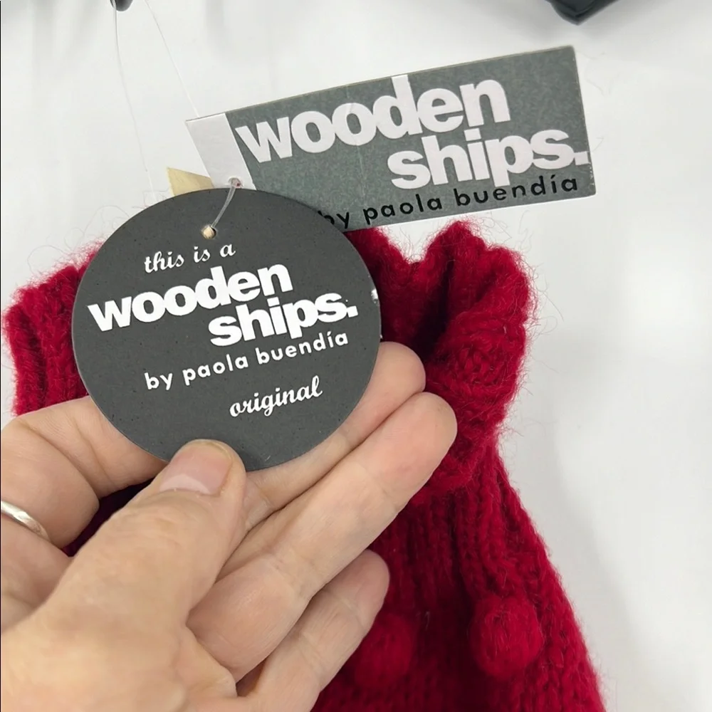 Wooden ships popcorn, fingerless glove with red raised Swiss dot bobble